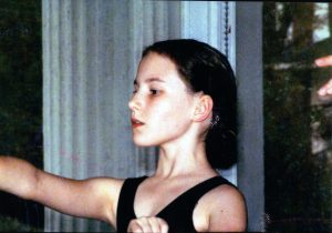 Rachel, training hard in ballet class. Around age 10.